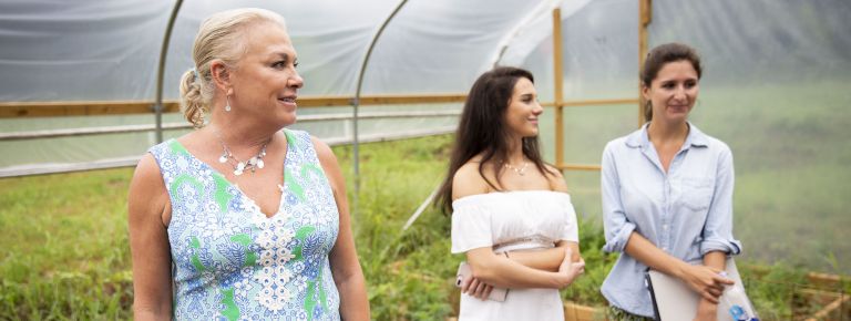 Three women in greenhouse